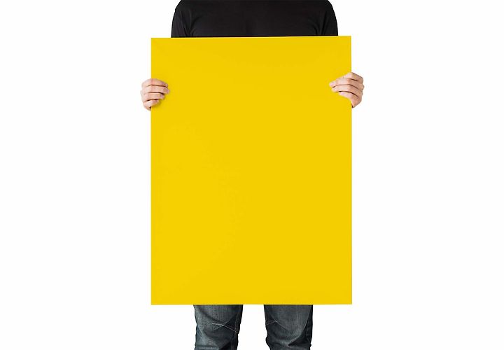 Man Holding A Poster Free Mockup Psd 1